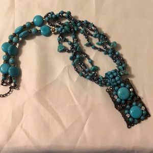 Turquoise colored pendant necklace